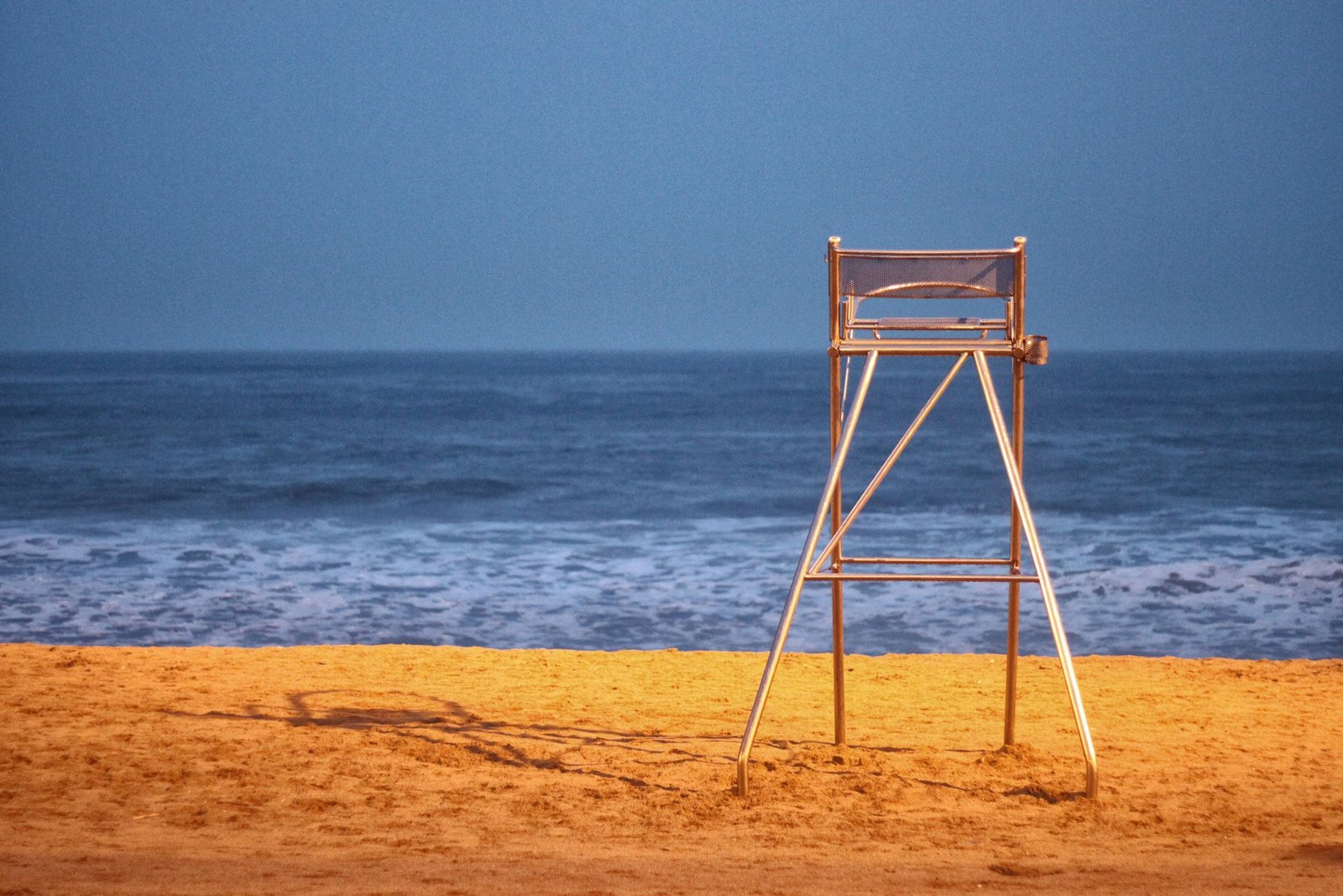 Free Things to Do in European Cities: Empty Lifeguard Chair Overlooking the Ocean